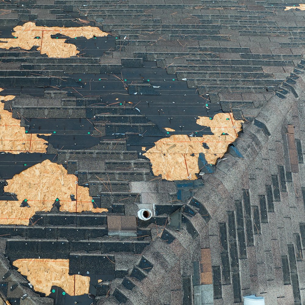 Damaged Roof with missing shingles Damaged Roof with missing shingles